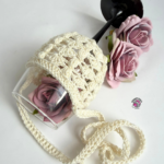 Hands-free wine tasting with a handmade crochet wine glass necklace holder.