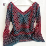 Crochet Zucchero Sweater with a V-neckline and wide bell sleeves.